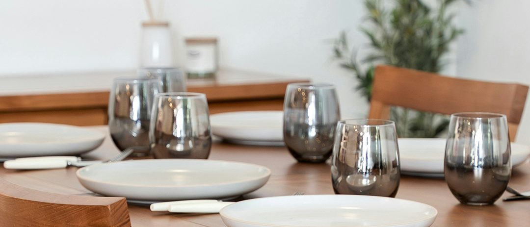 A dining table set for a simple meal at home